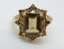 A 9ct gold ring set with a smoky quartz (size N)