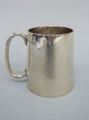 A George VI Scottish hallmarked silver tankard of plain tapering form,