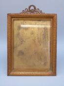A late 19thC gilt photograph/picture frame with ornate finial and optional easel back or suspension