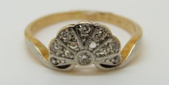 An 18ct gold Art Deco ring set with diamonds in a fan shaped platinum setting, 2.