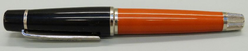 Breitling ballpoint pen with ochre resin barrel, black resin lid,