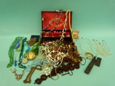 A collection of costume jewellery including beads,