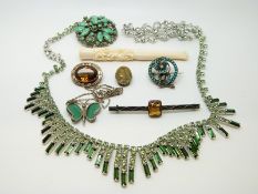 A Victorian brooch set with a large oval quartz,