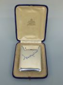 A WWI interest German white metal, enamel and ruby inset cigarette case with sapphire button,