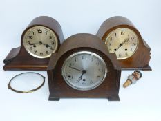 A 1930 'Napoleon hat' cased two train mantel clock with two train movement and Arabic dial,