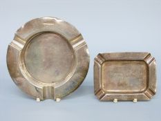 Two hallmarked silver ashtrays with commemorative inscriptions,