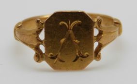 A yellow metal signet ring, 3.