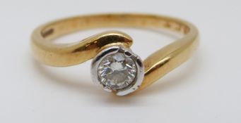An 18ct gold ring set with a diamond solitaire of approximately 0.25ct, 4.