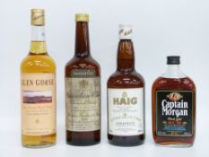 Four bottles of spirits comprising Haig Gold Label Scotch whisky, 70cl 40% vol,