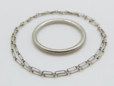 A platinum wedding band and a section of platinum chain, 3.