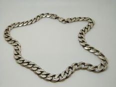 A silver curb link necklace marked 925, 92.