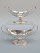 A pair of Georgian hallmarked silver oval twin handled bowls/salts,