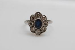 An 18ct white gold ring set with a sapphire of approximately 0.