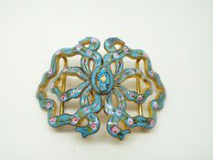 An early 20thC enamel buckle in the form of a bow with floral decoration, 7.5 x 5.