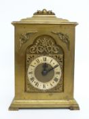 A brass carriage style / bracket clock, the keyless movement stamped Rotherham, England,