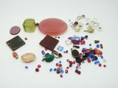 A collection of gemstones including agate and an intaligo seal