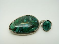 A hallmarked silver ring set with turquoise and similar brooch, 5cm x 3.