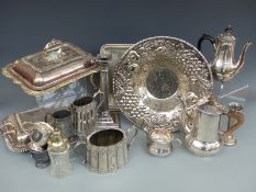 A quantity of silver plate to include coffee pots, trays, jugs, serving dishes, candlesticks,