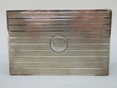 An unusually large George V hallmarked silver matchbox holder,