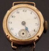 9ct gold ladies wristwatch with single blued hand, subsidiary seconds dial, and Arabic numerals,