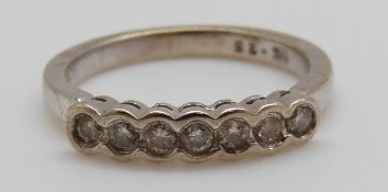 A 9ct white gold ring set with diamonds totalling approximately 0.25ct, 2.