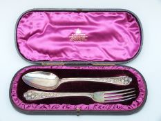 A cased hallmarked silver spoon and fork,