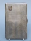 A large engine turned cigarette case, Birmingham 1951, length 14cm,