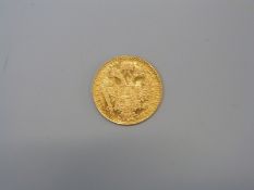 A 1915 Austrian 1 Ducat coin, 3.