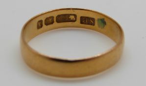 A 22ct gold wedding ring, 2.