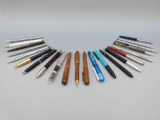 Twenty-two various fountain and ballpoint pens including Parker etc some sets.
