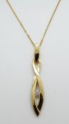 A 9ct gold necklace set with a cubic zirconia, 3.