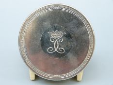 An Italian white metal circular trinket box with engraved coronet and initials to lid,