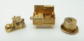 A 9ct gold charm in the form of a magician's hat opening to reveal a rabbit,
