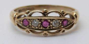 A 9ct gold ring set with diamonds and rubies (size L)