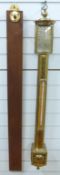 A brass marine barometer signed Negretti and Zambra, London,