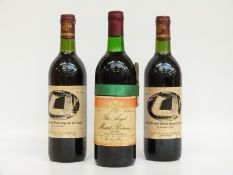 Three bottles of Welsh Rugby commemorative wine, two 1986 and one 1984,