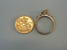 A 1910 Edward VII gold full sovereign and a mount to suit, 9.