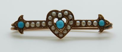 An Edwardian brooch set with turquoise and pearls in the form of a heart,
