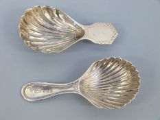 Two hallmarked silver caddy spoons of shell form, one Chester 1910, maker HF,