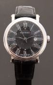 Swiss Master gentleman's wristwatch with date aperture, Roman numerals, silver hands and black face,