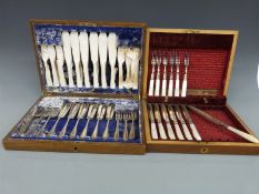 Two cased cutlery sets,