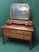 A Victorian inlaid mahogany dressing chest