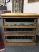 A reclaimed pine three drawer crate chest