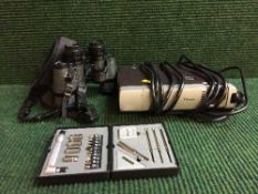 A basket containing Philips DLP projector,