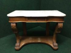 A carved pine marble topped washstand