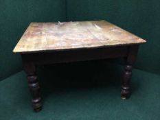 An antique pine kitchen table