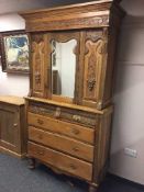 A late Victorian walnut mirror door press