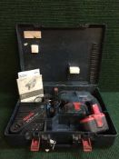 A Bosch JBH 24 VF hammer drill with battery and charger in case