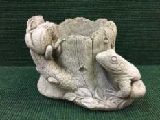 A garden figure - frog planter