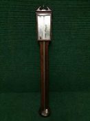 A 19th century mahogany stick barometer by G.